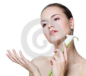 Spa beauty girl showing empty copy space on the open hand isolated on white