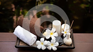 Spa beauty massage healthy wellness background. Spa Thai therapy treatment aromatherapy for body woman with flower Plumeria
