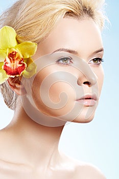 Spa beauty with orchid flower, wellness, skin care