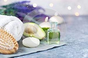 Spa, beauty treatment and wellness background Towel Cosmetic Massage oil, flowers, lights and candel