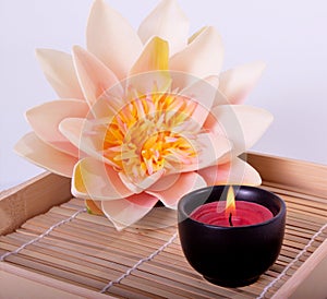 Spa candle and flower for aromatherapy