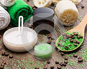 Spa and cellulite busting products on wooden surface photo