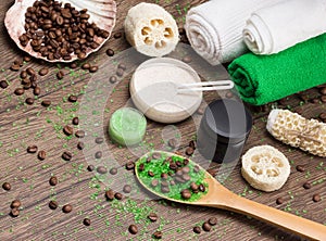 Spa and cellulite busting products on wooden surface photo