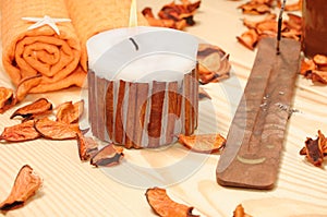 SPA cinnamon candle with dried-up orange petals