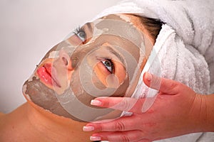 Spa clay mask on a woman's face