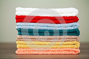 Spa. Colored Cotton Towels Use In Spa Bathroom. Towel Concept. Photo For Hotels and Massage Parlors. Purity and Softness