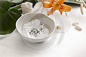 Spa composition with powder face mask and flowers