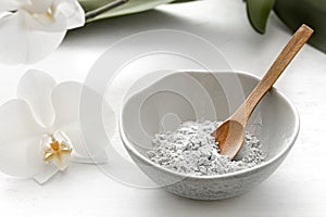 Spa composition with powder face mask and orchid flower