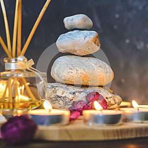 Spa composition-stones, candles, aromatherapy, dry flowers