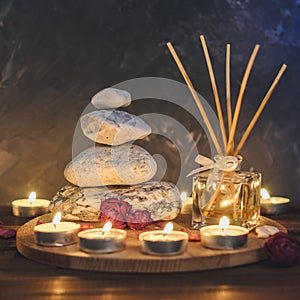 Spa composition-stones, candles, aromatherapy, dry flowers