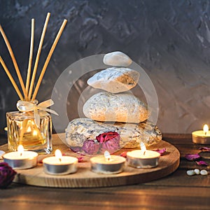 Spa composition-stones, candles, aromatherapy, dry flowers