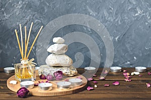 Spa composition-stones, candles, aromatherapy, dry flowers