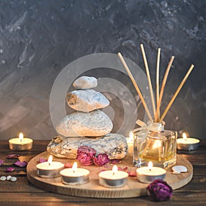 Spa composition-stones, candles, aromatherapy, dry flowers