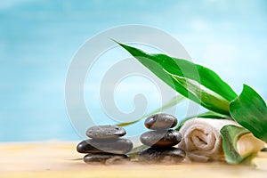 Spa concept with candle, stone, flower and bamboo