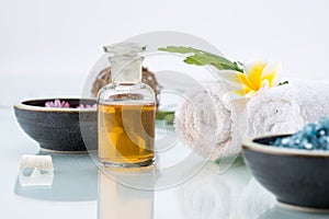 Spa concept with Floating Flowers, essential oil, and salt