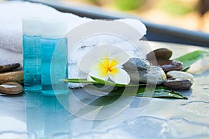 Spa concept with flowers, stones and towel