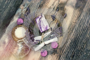 Spa concept - lavender soap, scented salt and dry lavender