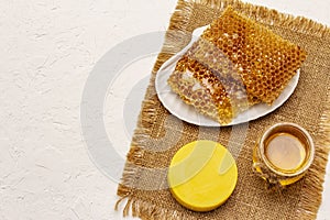 Spa concept. Self care with honey and honeycombs. Natural organic cosmetics, homemade product, alternative lifestyle