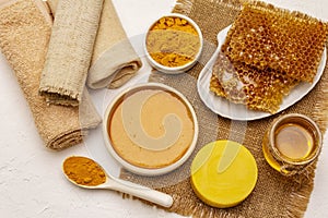 Spa concept. Self care with honey and turmeric. Natural organic cosmetics, homemade product, alternative lifestyle