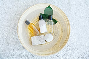 Spa essentials including natural oils, salt, soap. Organic cosmetics concept