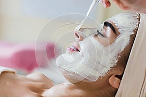 Spa facial mask application photo