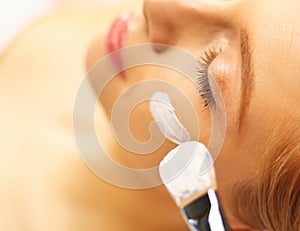 Spa facial mask application. Spa beauty organic facial mask application at day spa salon