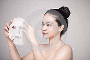 Spa, healthcare. Woman with purifying mask on her face isolated