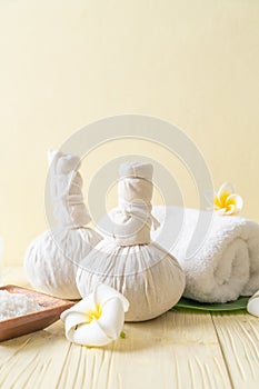 Spa herbal compressing ball with candle and orchid