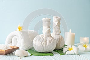 Spa herbal compressing ball with candle and orchid