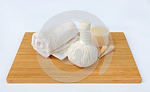 Spa herbal compressing ball with towels and Salt Scrub, Spa concept background