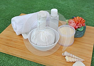 Spa herbal compressing ball with towels and Salt Scrub, Spa concept background