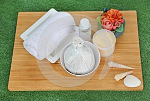 Spa herbal compressing ball with towels and Salt Scrub, Spa concept background