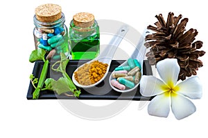 Spa herbal white frangipani flowers, turmeric powder in white spoon ,pill,Cissus Quadrangularis Linn,pine,Aloe vera essential oil