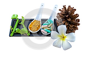 Spa herbal white frangipani flowers, turmeric powder in white spoon ,pill,Cissus Quadrangularis Linn,pine isolated on white