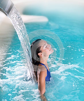 Spa hydrotherapy woman waterfall jet