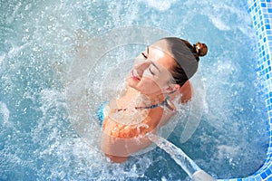 Spa hydrotherapy woman waterfall jet photo