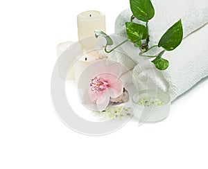 Spa items with orchid on white background