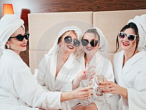 Spa leisure relaxation females bathrobes champagne
