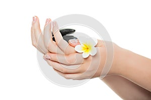 Spa manicure concept. Woman hands with french manicure isolated