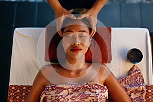 Spa Massage. Hands Massaging Woman Head At Thai Beauty Salon