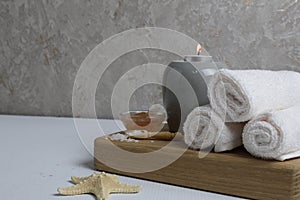Spa massage relax. Towels scrub salt candles with space for text copyspace