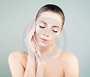 Spa Model Woman with Healthy Skin touching her Hand her Skin. Sk