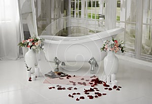 Spa Relax In Flower Bath. Spa Salon. Bath with rose petals. Relaxation with rose petals. Composition. still life