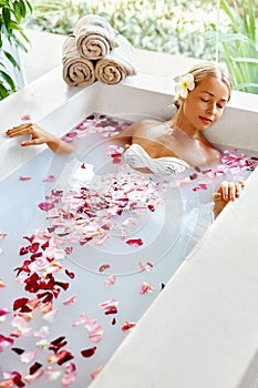 Spa Relaxation. Woman Body Care. Flower Bath. Beauty Skincare