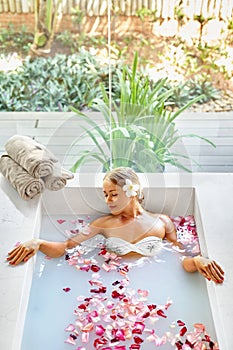 Spa Relaxation. Woman Body Care. Flower Bath. Beauty Skincare