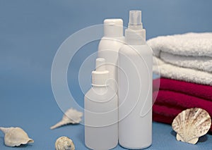 SPA set of cosmetic bottles and tubes. Face body care concept: composition of creams, lotions, serums. Cosmetic bottle, flask,