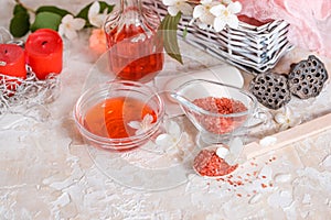 Spa set: scented candle, sea salt, liquid soap and romantic red roses