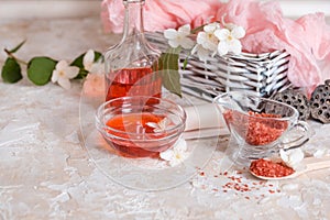 Spa set: scented candle, sea salt, liquid soap and romantic red roses