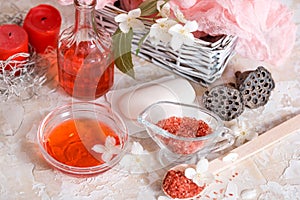 Spa set: scented candle, sea salt, liquid soap and romantic red roses