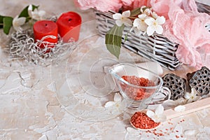 Spa set: scented candle, sea salt, liquid soap and romantic red roses